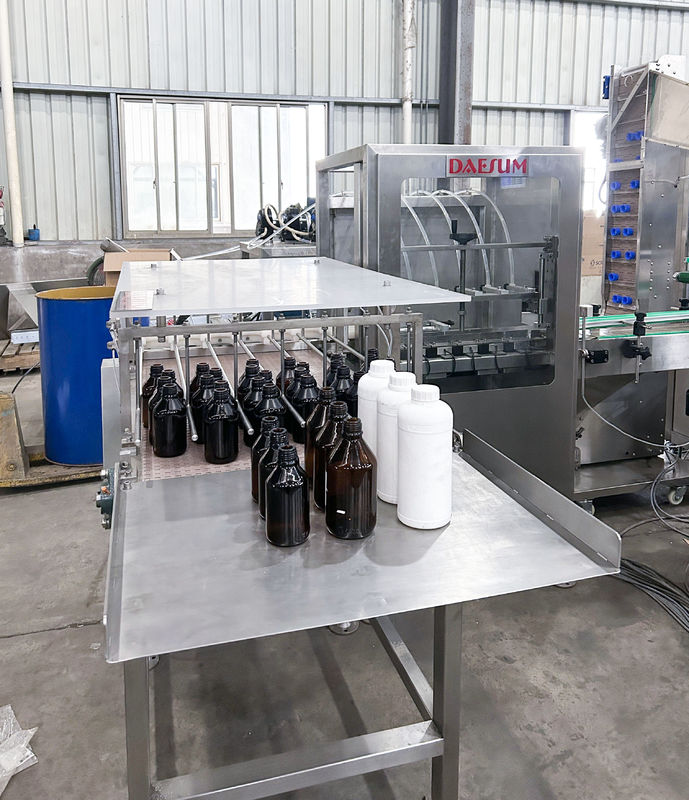 Fully Automatic 250-500ml Small Bottle Filling Machine with 6-16 Nozzles and 1000-2000 BPH Speed